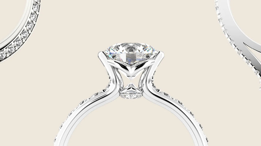 3 bagues de fiançailles Unity Diamonds sur un fond beige